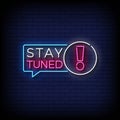 Neon Sign stay tuned with brick wall background vectorNeon Sign stay tuned with brick wall background vector Royalty Free Stock Photo