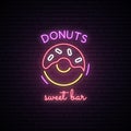 Neon sign of Sweet Donuts. Neon cafe emblem, bright banner. Advertising design.