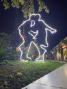 Neon silhouette of dancing couple