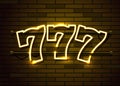 Neon 777 slots sign. Casino neon signboard. Online casino concept.