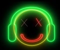 Neon smiley face with headphone. Gamer, DJ emoji, playing game or listening music. Happy glowing face