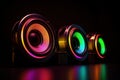 Neon Stereo Speakers on Dark Background with Reflection for Music Lovers. Royalty Free Stock Photo