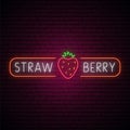 Neon strawberry sign.