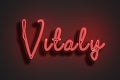 Red Neon Style Text Effect of name Vitaly on red background Royalty Free Stock Photo