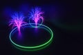 Neon tree with a ring in a dark room at night.