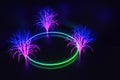 Neon tree with a ring in a dark room at night.