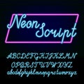 Neon tube alphabet font. Hand drawn script type letters and numbers on a dark background. Royalty Free Stock Photo