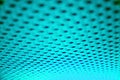 Neon turquoise abstract pattern with holes and lines