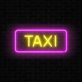 Neon uber and taxi transportation services signs in a geometrical shape on a brick background.