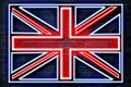 Neon Union Jack Flag on a Dark Wall Royalty Free Stock Photo