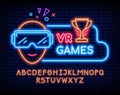 Neon video game text. VR computer gaming. Glowing signboard. Alphabet uppercase letters. Gamer with virtual reality