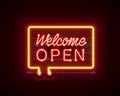 Neon welcome open signboard on the brick wall background. Royalty Free Stock Photo