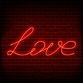 Neon word love. A bright red sign on a brick wall. Element of design for a happy Valentine s day. Vector illustration Royalty Free Stock Photo