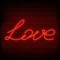 Neon word love. A bright red sign on a brick wall. Element of design for a happy Valentine s day. Vector illustration Royalty Free Stock Photo