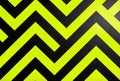Neon Yellow and Black Abstract Chevron Zigzag Geometric Pattern Royalty Free Stock Photo