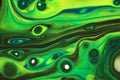 Neon yellow and green flow with black in this abstract background.