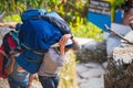 Nepal - 25 December 2016 :: Sherpas carry heavy backpack and walk to mountain