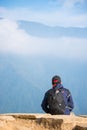 Nepal - 27 December 2016 :: traveller is sitting on the cliff for see beautiful view