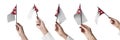 The Nepal flag in hand in different angles on a white background Royalty Free Stock Photo