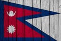 Nepal Flag Over Wood Planks