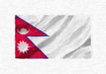 Nepal hand painted waving national flag.