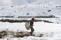 Nepal, Himalayas, Octoder, 19, 2013. Trekking to Gokio Lake. woman high in the mountains