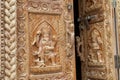 Nepal Kathmandu temple of Changu Narayan, view of an ancient wooden door carved with sacred images