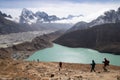 Nepal Female Tourist Hikking at gokyo ri mountain peak near gokyo lake during Everest base camp trekking in nepal