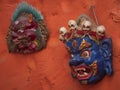 Wooden painted masks representing Mahakala and protector Garuda from buddhist believes.