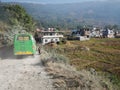 Nepalese driver worker driving retro vintage buses for send nepali people and foreign travelers from Kathmandu to Pokhara hill