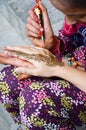Nepalese girl paint Mehndi or Henna india style for thai traveler