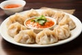 Nepalese Momos On A White Plate Royalty Free Stock Photo