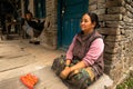 Nepalese mother and child on the porch