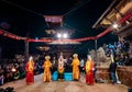 Nepalese people performing and watching traditional dance called Kartik Naach during night time