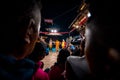 Nepalese people performing and watching traditional dance called Kartik Naach during night time