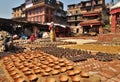 Nepalese people are shaping and drying up ceramics pots in Pottery Square