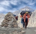 Nepalese porters in Dolpo, Nepal, Himalayas Royalty Free Stock Photo