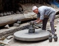 Nepalese potter working in the his pottery workshop