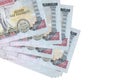 1000 Nepalese rupees bills lies in small bunch or pack isolated on white. Mockup with copy space. Business and currency exchange