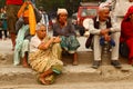 Nepalese sat on the side of the street Royalty Free Stock Photo