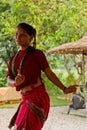 Nepalese woman dancing traditional dance in Chitwan, Nepal