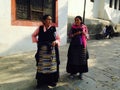 Nepalese women in traditional colorful clothes.