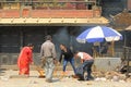 Nepalese worshipers giving religious offerings in Nepal