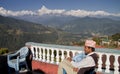 Nepali men and the anapurna mountain range Royalty Free Stock Photo