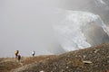 Nepali porters in the Annapurna Circuit, Nepal. Royalty Free Stock Photo