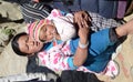 Nepali woman and her baby