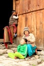 Nepali woman with her children near the house. Royalty Free Stock Photo