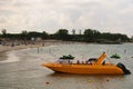 Neptun, Romania - July 8, 2017: Yellow speed boat for tourism. People having fun at the beach resort in Neptun, Constanta, Romania Royalty Free Stock Photo