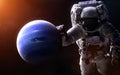 Neptune on a blurred background with a giant astronaut. Elements of the image are furnished by NASA