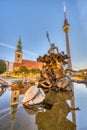 The Neptune Fountain at Alexanderplatz in Berlin at sunrise